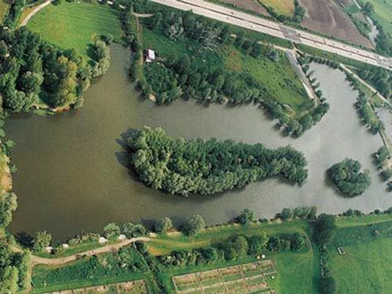 Broadlands Main Lake, a 26-acre carp fishery fed by the famous River Test in Southampton, Hampshire.