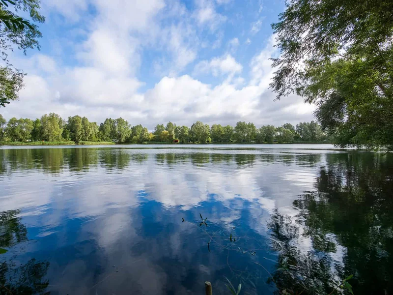 A scenic view across the challenging Sandmartin Lake at Bluebell Lakes.
